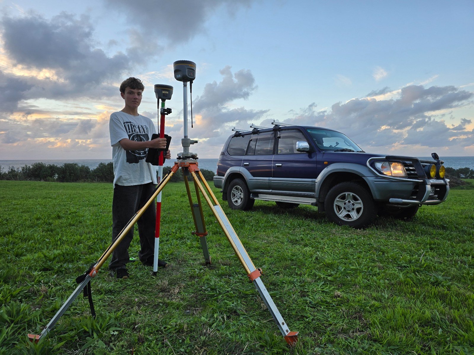 Malachi Kirk with GNSS equipment
